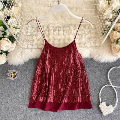 Modern női felső vékony pántokkal és flitterekkel