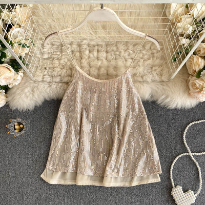 Modern női felső vékony pántokkal és flitterekkel