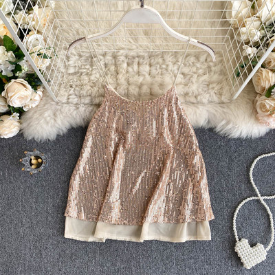 Modern női felső vékony pántokkal és flitterekkel