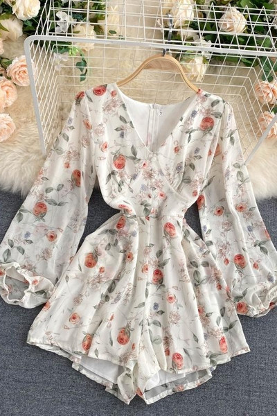 Modern női overál virágmintával és V-nyakkal