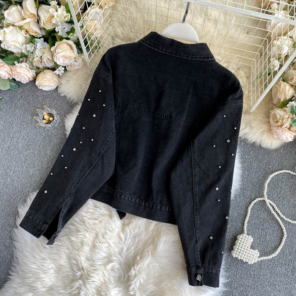 Must teksajakk taskute ja pärlitega