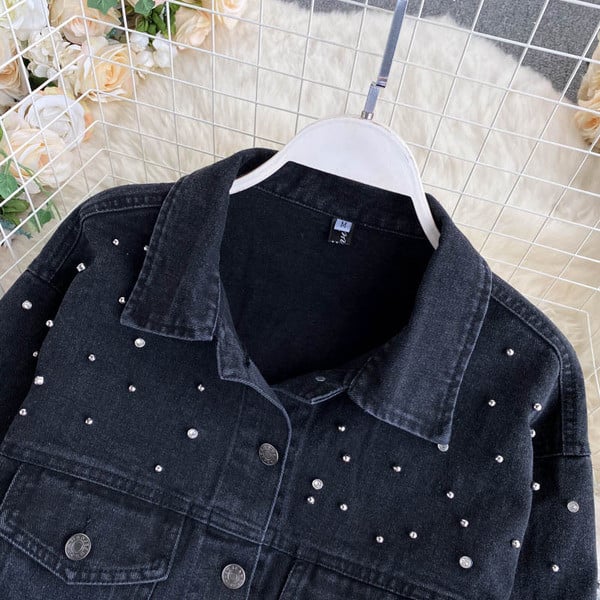 Must teksajakk taskute ja pärlitega