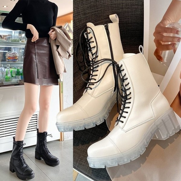 Aktualne ženske kožne čizme s grubim potplatom