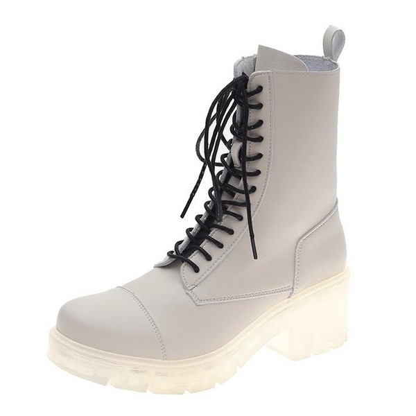 Aktualne ženske kožne čizme s grubim potplatom