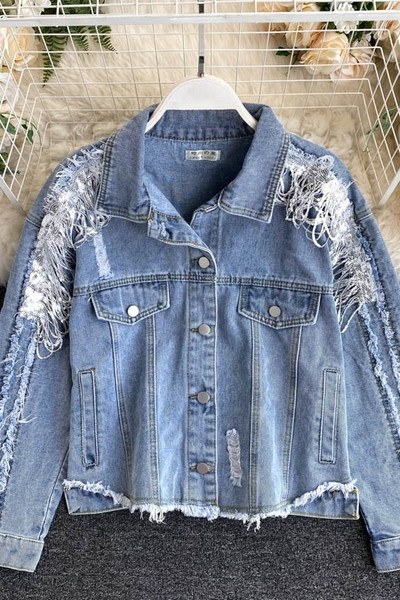 Ajakohane rebenenud motiividega naiste teksajakk