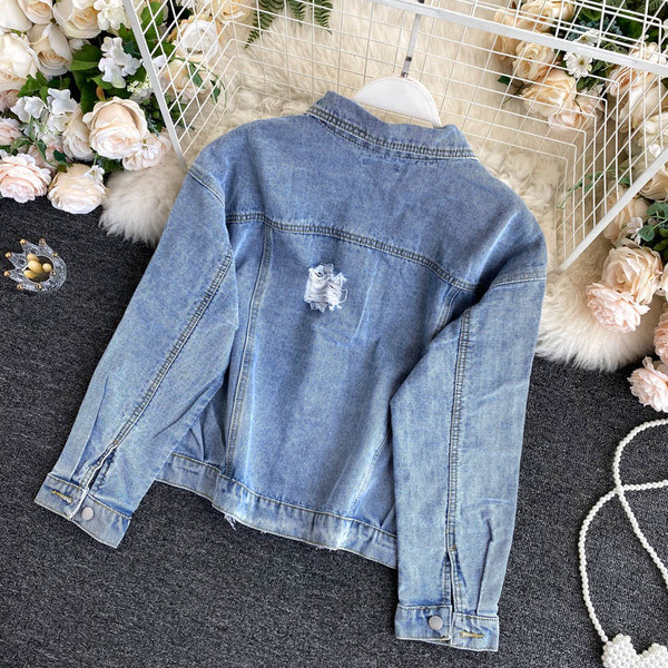 Ajakohane rebenenud motiividega naiste teksajakk