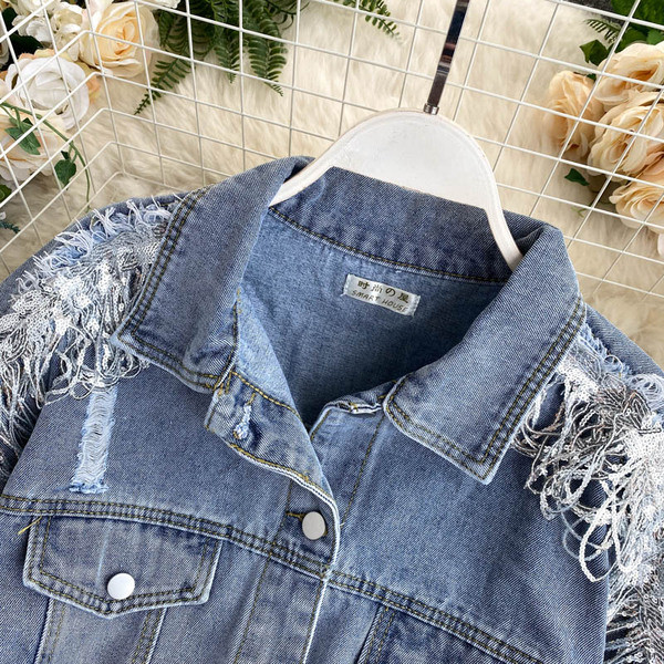 Ajakohane rebenenud motiividega naiste teksajakk