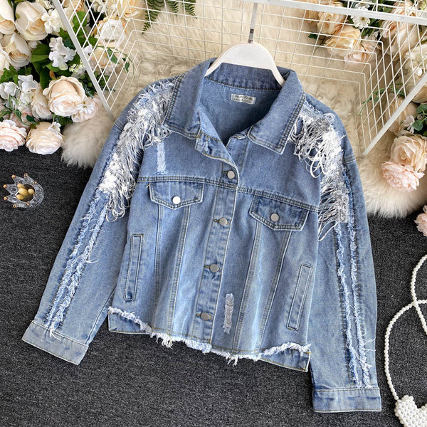 Ajakohane rebenenud motiividega naiste teksajakk