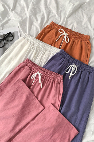 Lezser női nadrág széles modell nyakkendővel