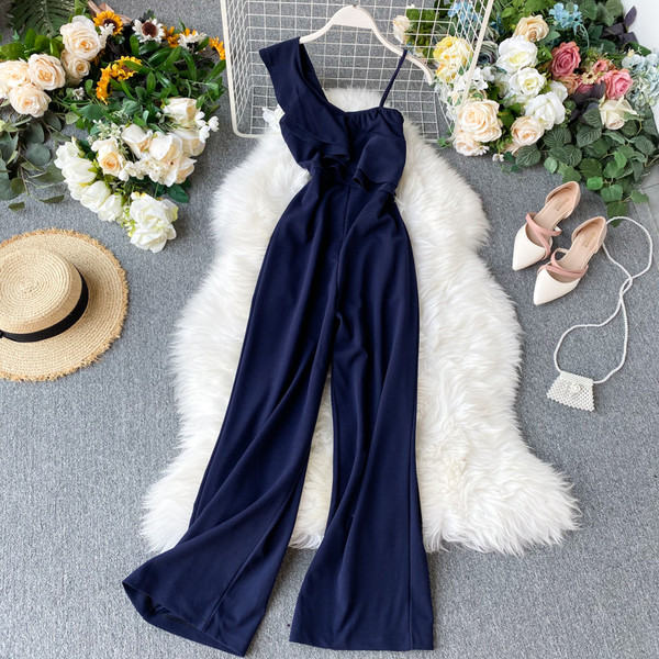 Moderan dugi ženski kombinezon s kovrčama