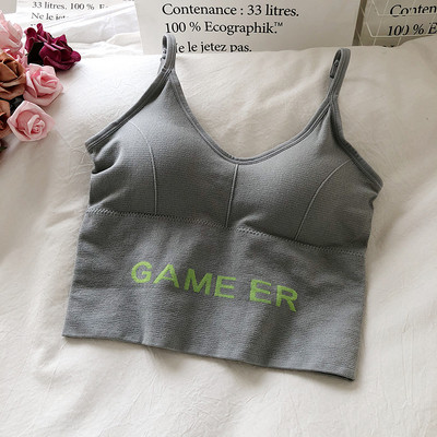 Tikandite ja õhukeste rihmadega naiste topp