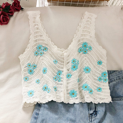 Tikandite ja laiade rihmadega naiste pitsist topp