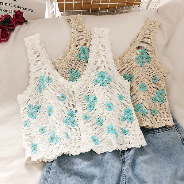 Tikandite ja laiade rihmadega naiste pitsist topp