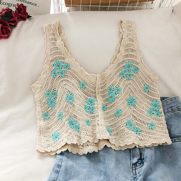 Tikandite ja laiade rihmadega naiste pitsist topp