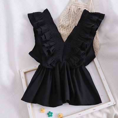 Modern női felső fürtökkel és spitz nyakkivágással