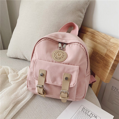 Μικρό γυναικείο σακίδιο με αγκράφες