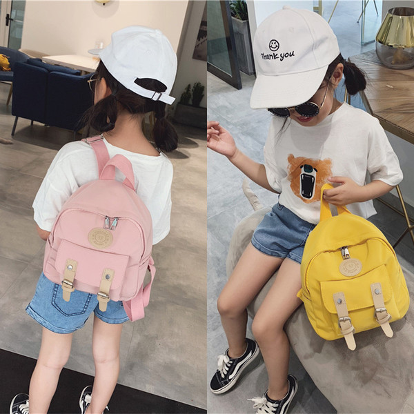 Μικρό γυναικείο σακίδιο με αγκράφες