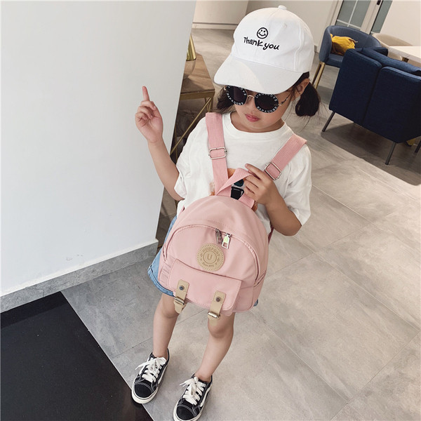 Μικρό γυναικείο σακίδιο με αγκράφες