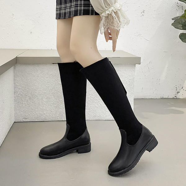 Öko bőrből készült modern női csizma hegyes modell