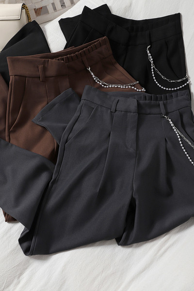 Moderne ženske hlače s visokim strukom i metalnim lancem