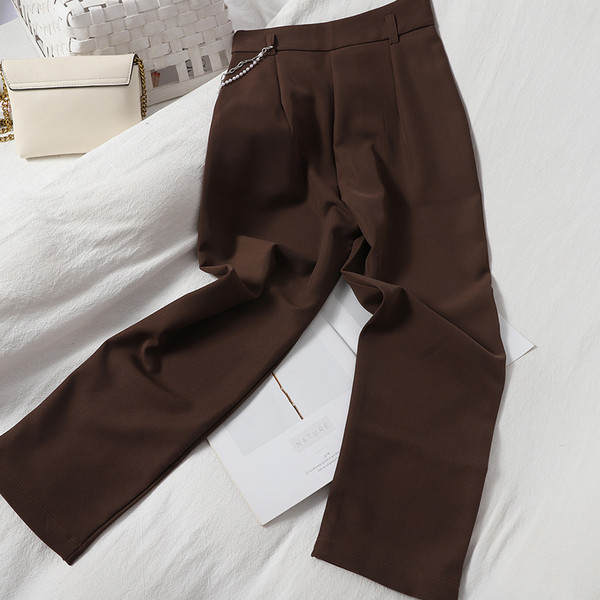 Moderne ženske hlače s visokim strukom i metalnim lancem