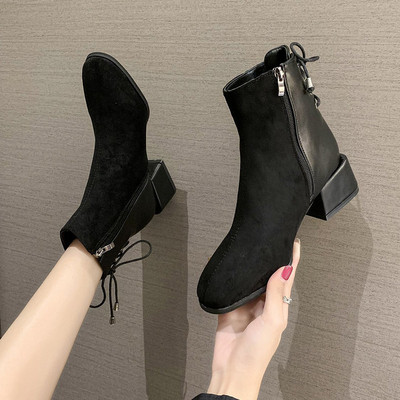 Kahes värvitoonis ökoseemisnahast stiilsed paeltega naiste saapad