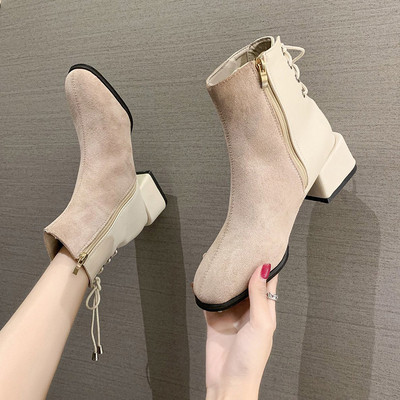 Kahes värvitoonis ökoseemisnahast stiilsed paeltega naiste saapad