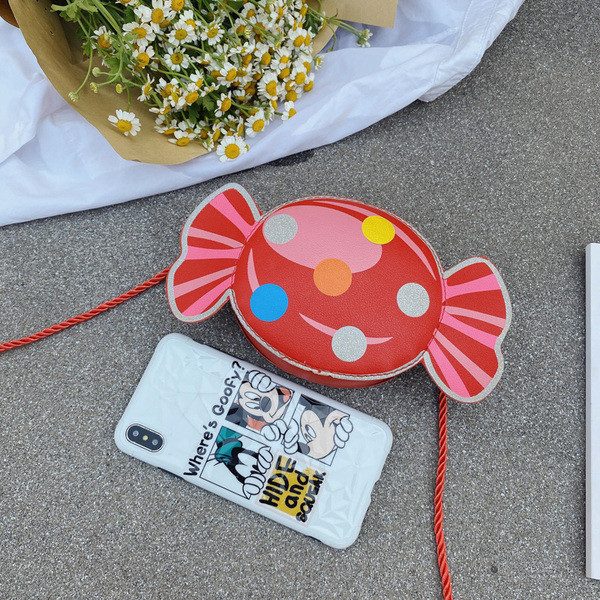 Lastekott kommide kujul