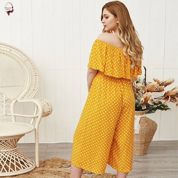 Stilīgs sieviešu kombinezons ar nolaistām piedurknēm dzeltenā krāsā