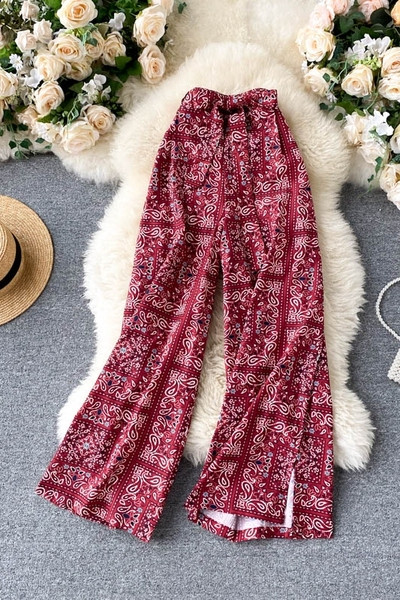 Laiad naiste pikad kummikuga püksid