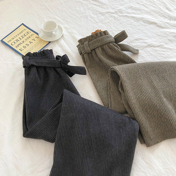 Alkalmi női hosszú nadrág magas derékkal és övvel