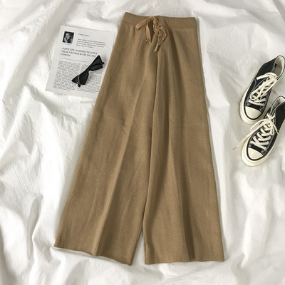 Őszi női nadrág széles modell derékkötővel