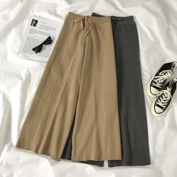 Őszi női nadrág széles modell derékkötővel