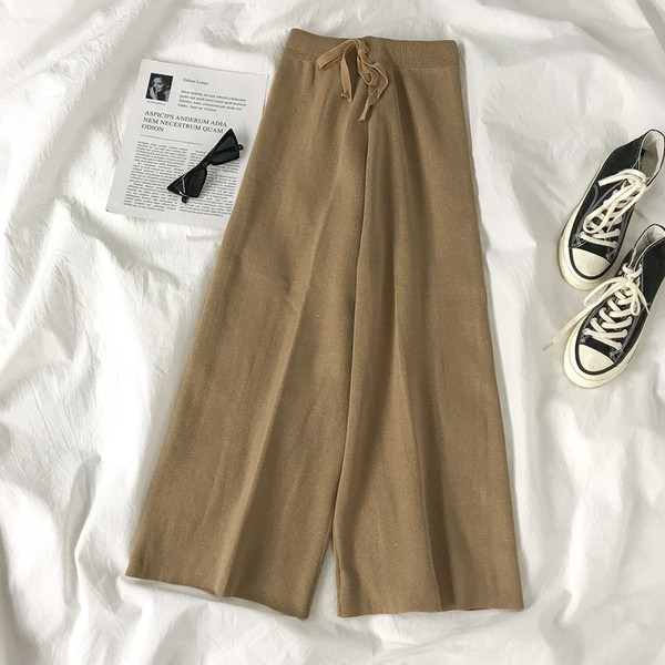 Őszi női nadrág széles modell derékkötővel