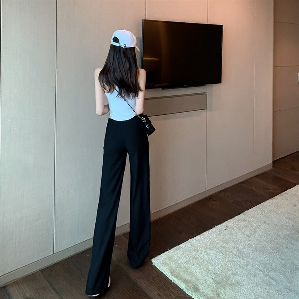 Μοντέρνο γυναικείο μαύρο παντελόνι με ψηλή μέση και κομμένα μέρη