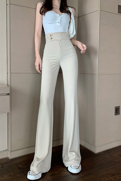 Laiad nööpidega naistepüksid ja kõrge vöökoht