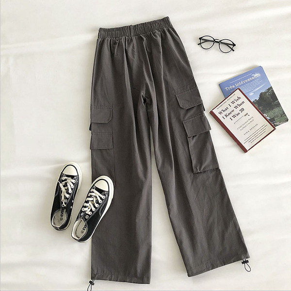 Naiste laiad elastse ja metallist ketiga püksid