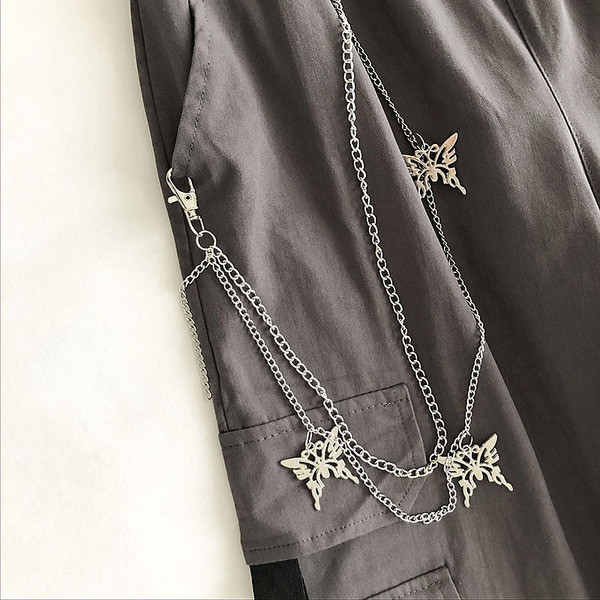 Naiste laiad elastse ja metallist ketiga püksid