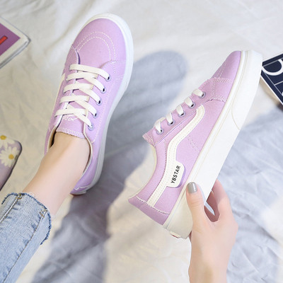 Női tornacipők új modellje textil nyakkendővel