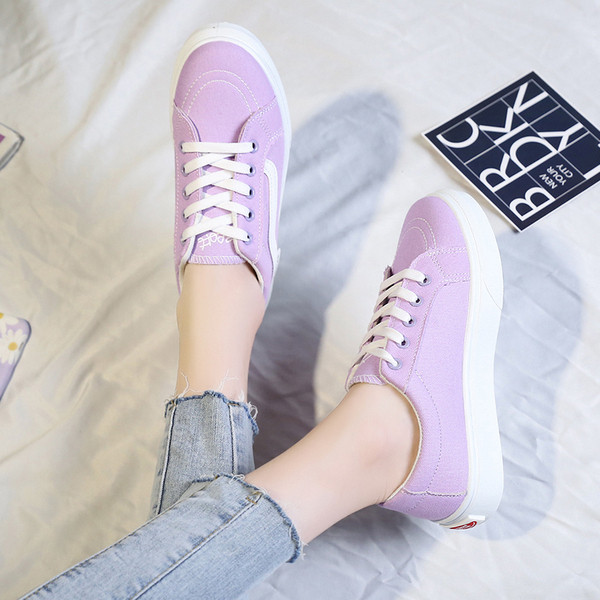 Női tornacipők új modellje textil nyakkendővel