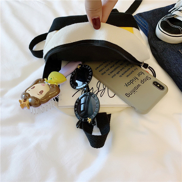 Laste seljakott kirjaga