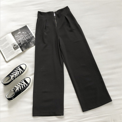 Női nadrág magas derékkal és cipzárral - széles modell