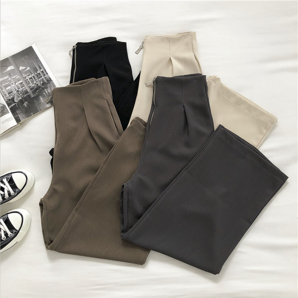 Női nadrág magas derékkal és cipzárral - széles modell