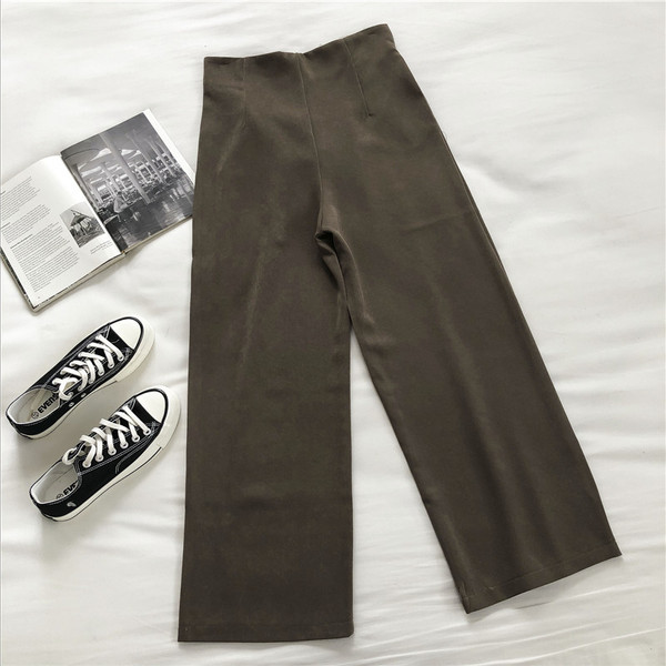 Női nadrág magas derékkal és cipzárral - széles modell