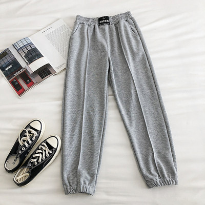 Alkalmi női nadrág gumírozással és zsebbel