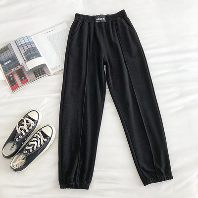 Alkalmi női nadrág gumírozással és zsebbel