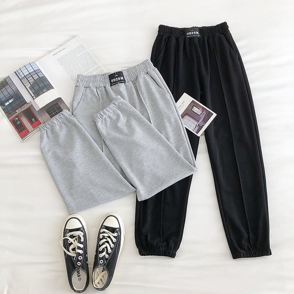 Alkalmi női nadrág gumírozással és zsebbel