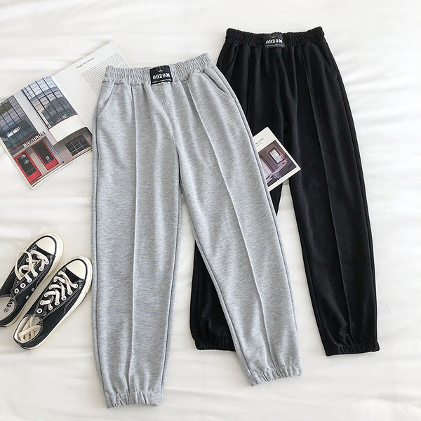 Alkalmi női nadrág gumírozással és zsebbel