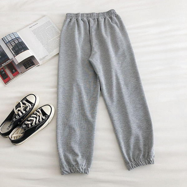 Alkalmi női nadrág gumírozással és zsebbel