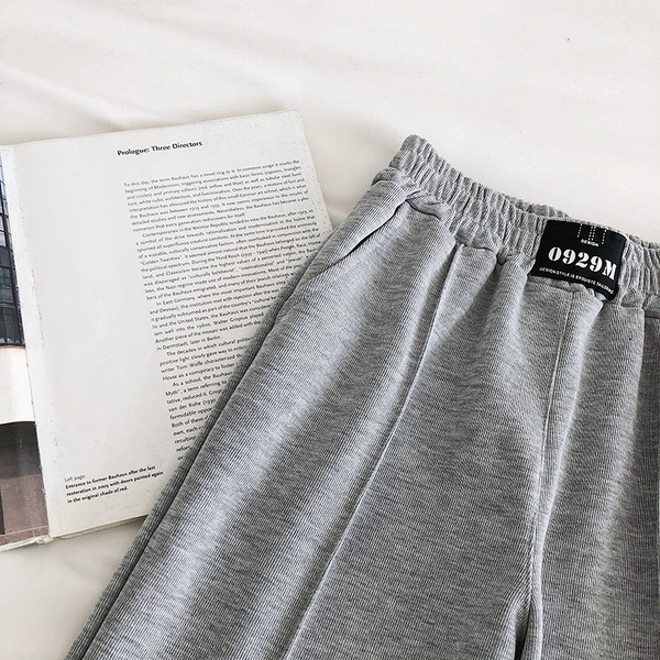 Alkalmi női nadrág gumírozással és zsebbel